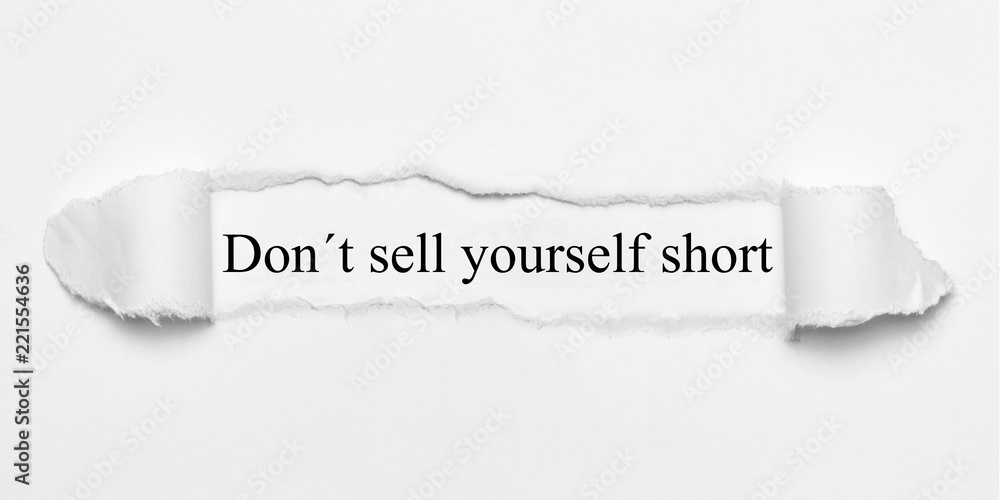 Don´t sell yourself short on white torn paper Stock Photo | Adobe Stock