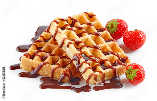 waffles with strawberries and chocolate sauce