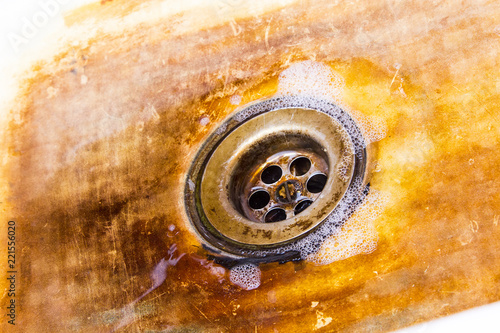 A rusty old sink in the kitchen