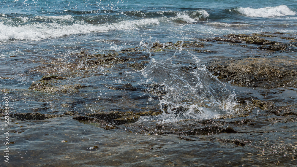 Sea water splashing on the rock Sea water splashing on the rock
