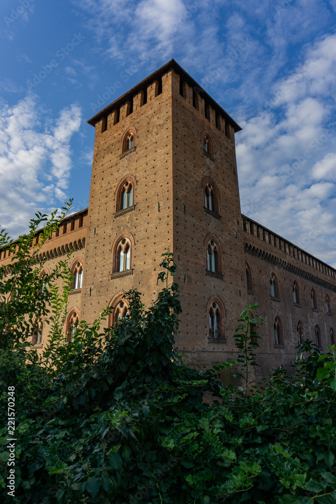 The facade of the Visconti Castle ( castello visconteo ). Medieval building with red brick facades in Pavia, Lombardy, Italy
