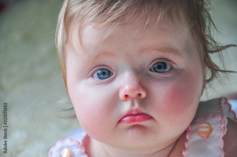 Portrait of a six-month-old baby close-up. Portrait of a six-month-old baby close-up.
