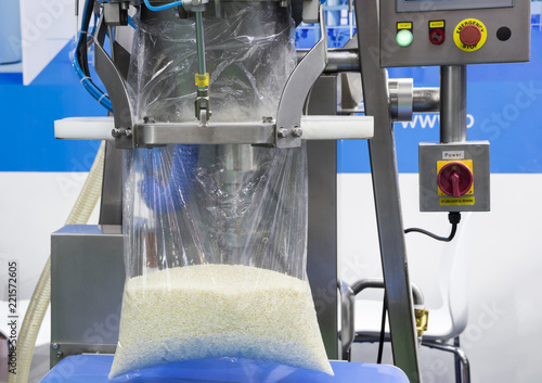 Rice fill into plastic by packing machine