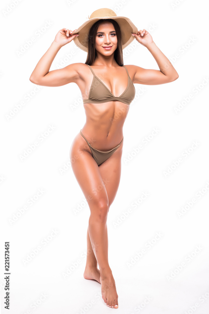 Full length beautiful slim tanned woman in bikini with sexy body wearing  summer hat, isolated on white background Stock Photo | Adobe Stock