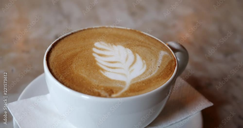 Close up coffee cup with latte art Close up coffee cup with latte art