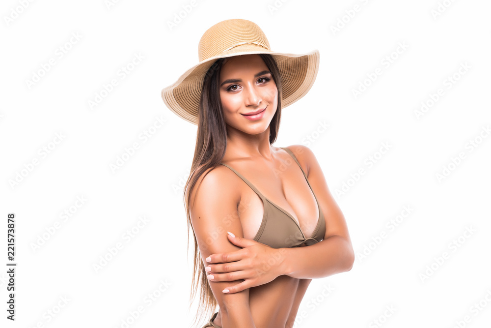 Portrait of young perfect body woman in bikini and big straw hat against white background Portrait of young perfect body woman in bikini and big straw hat against white background