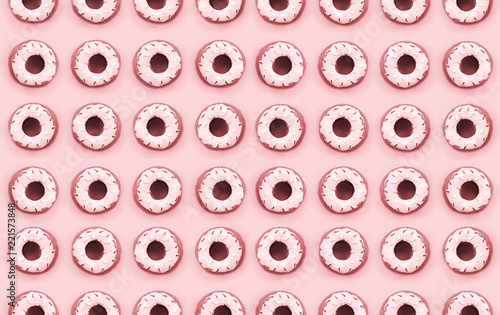 Many small plastic donuts lies on a pastel colorful background. Flat lay minimal pattern. Top view photo