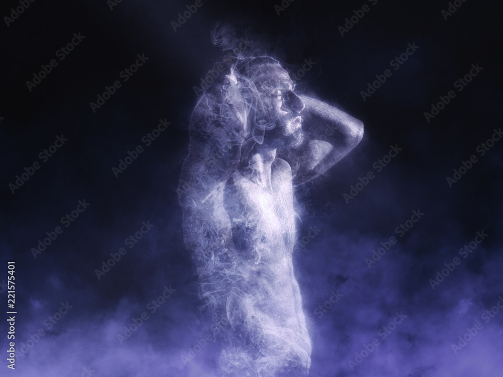 Handsome shirtless man with muscular torso holding hands on head in smoke effect on dark background
