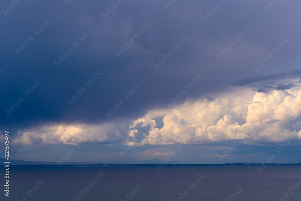 Fototapeta premium Storm clouds gather over the sea.