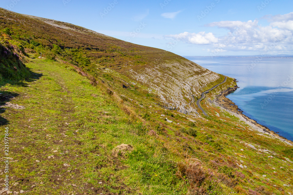 Burren way trail with Galway bay in background