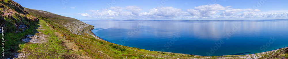 Burren way trail with Galway bay in background Burren way trail with Galway bay in background