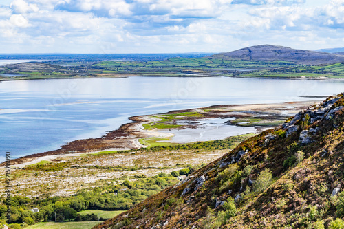 Ballyvaughan bay with farm and beach photo