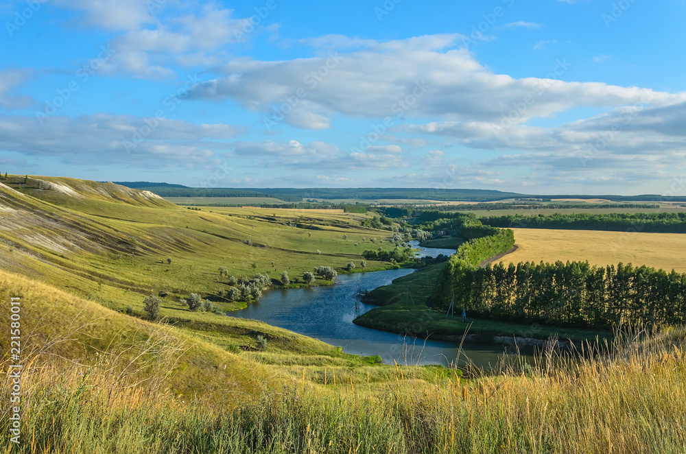 Fototapeta premium The little river and hills of the Volga region. Russia, Shilovka.