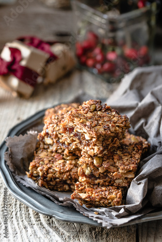 Flapjack of oats, pumpkin seeds, sunflower seeds and dried fruit, in gift packets for Christmas 