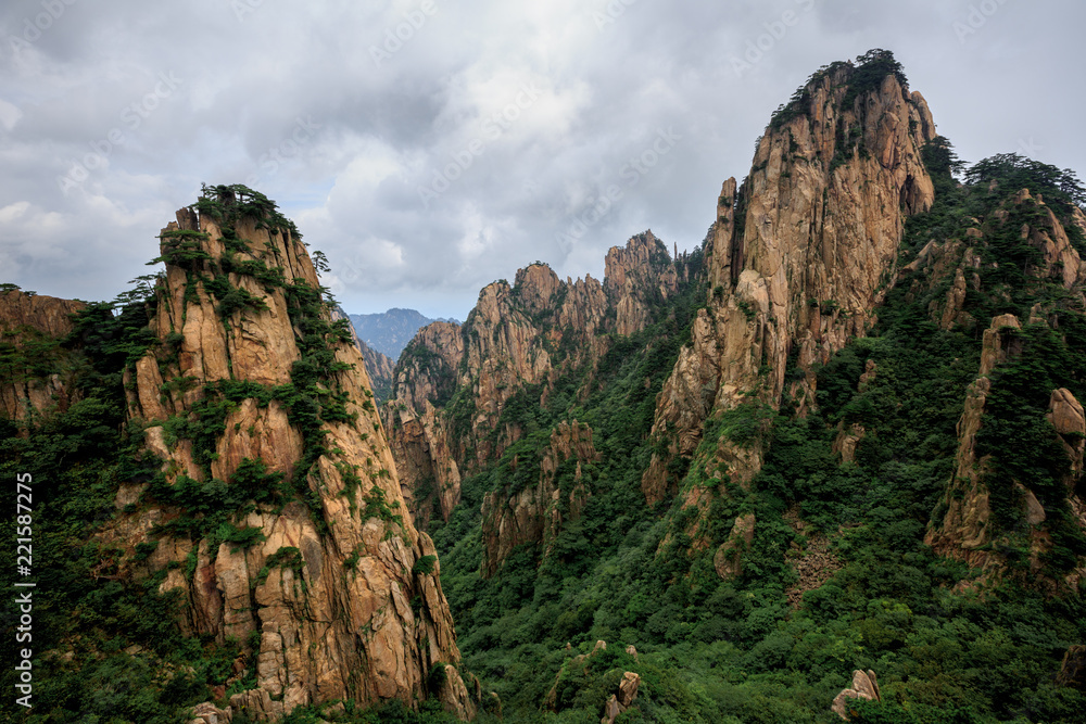 Huangshan China National Park - Anhui Province, Chinese Mountain Peak. Viewing Platform, Yellow Granite Mountains with Canyon, Exotic Pine Trees and Forest, Jagged Cliffs, UNESCO World Heritage Site