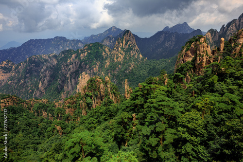 Huangshan China National Park - Anhui Province, Chinese Mountain Peak. Viewing Platform, Yellow Granite Mountains with Canyon, Exotic Pine Trees and Forest, Jagged Cliffs, UNESCO World Heritage Site © Cedar
