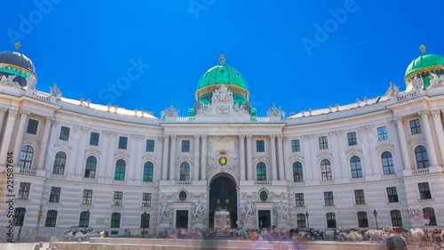 Hofburg Palace seen from Michaelerplatz on a summer sunny day. Time lapse. photo