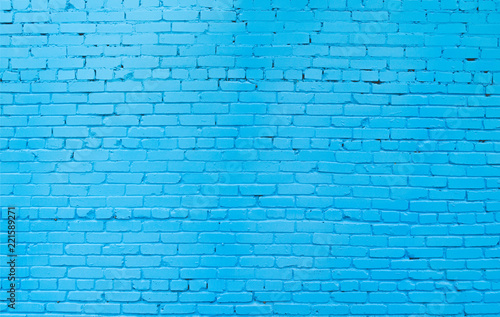 Background and texture of brick wall painted blue.