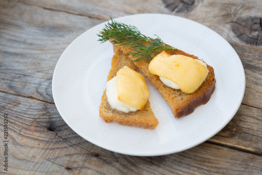 Fried toasts with baked egg and cheese Fried toasts with baked egg and cheese