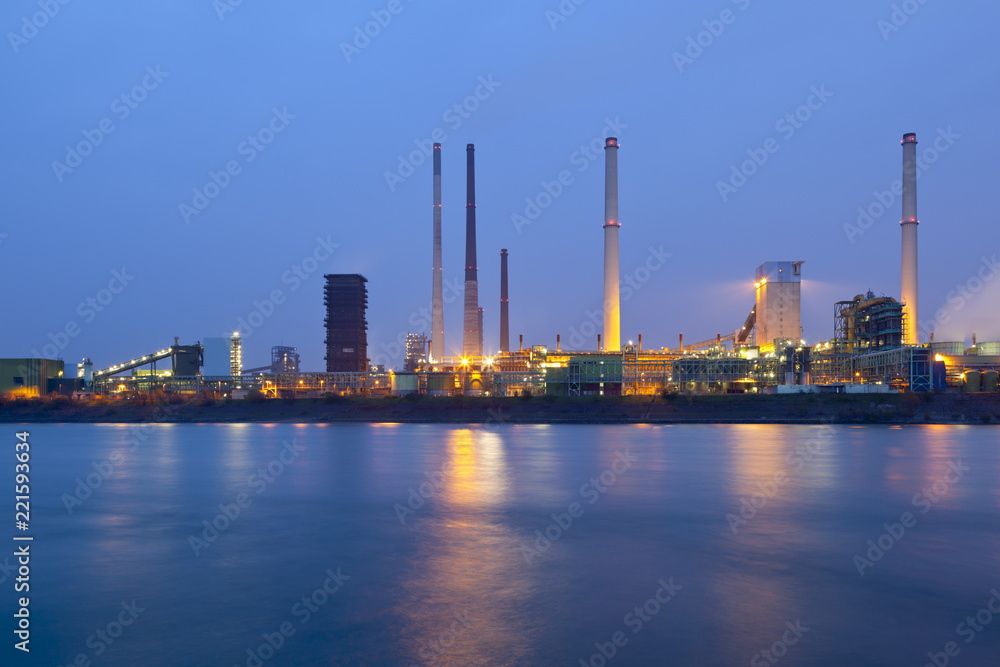 Industry By River At Night