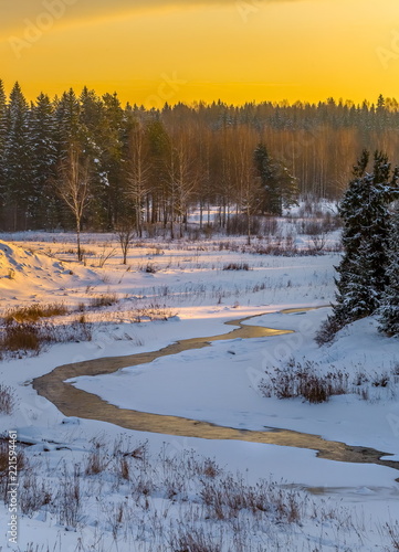 Winter river. Good New Year spirit. Pine and spruce in the snow. Magic clouds. Panoramas.