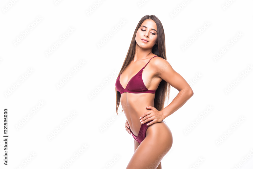 Young woman with beautiful slim perfect body in bikini isolated white background - obrazy, fototapety, plakaty 