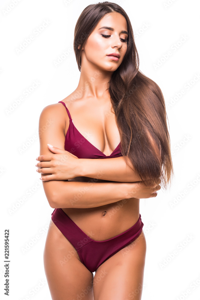 Portrait of happy beautiful fit woman isolated on white background