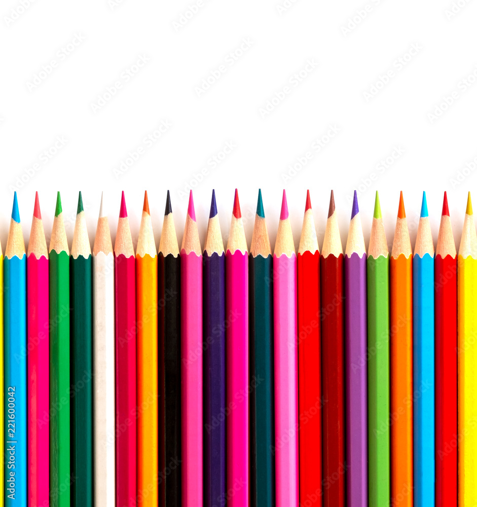 Color pencils are located in one line with a pointed side on a white background. background is isolated. seamless texture Color pencils are located in one line with a pointed side on a white background. background is isolated. seamless texture