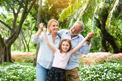 Portrait of happy family in background