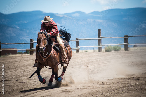 Cowboy Gallops Horse