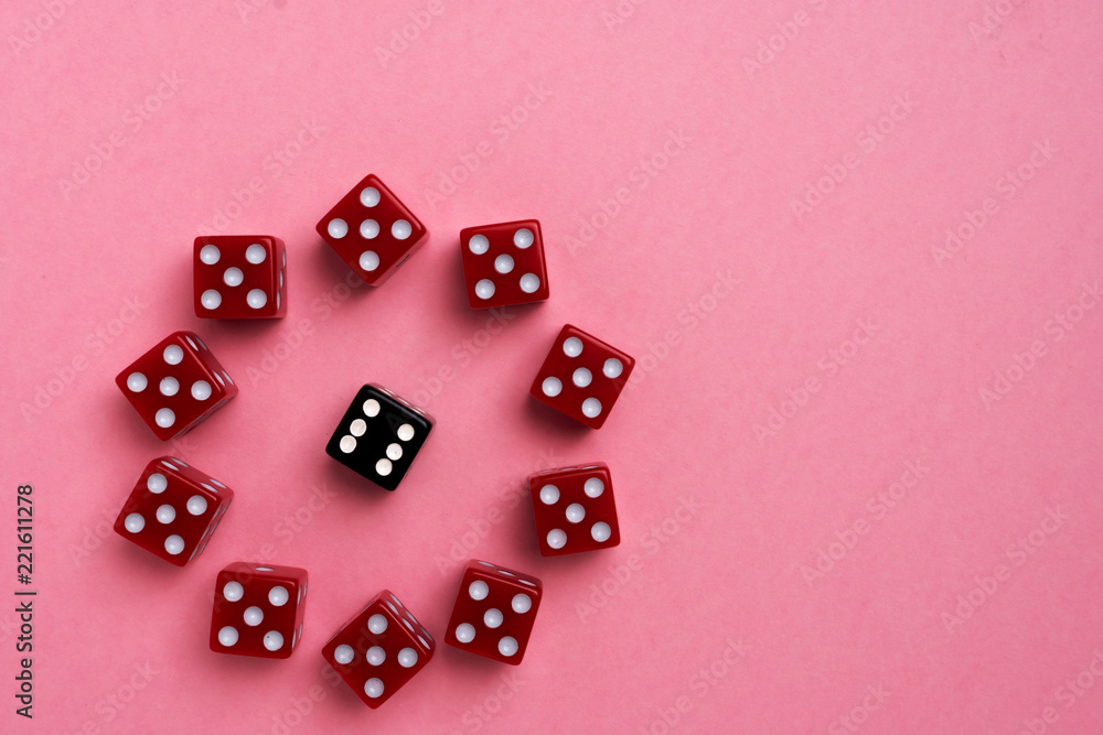 Red gaming dices on pink background. Flat lay, place for text. Game concept Red gaming dices on pink background. Flat lay, place for text. Game concept