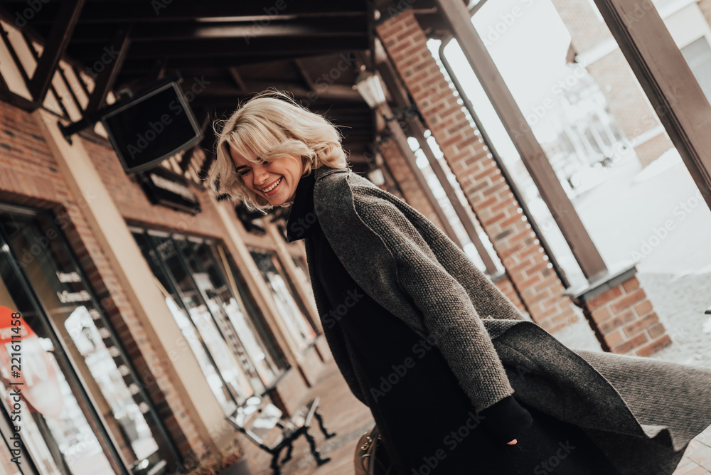 Emotional portrait of Fashion stylish woman. Young beautiful girl in the city at shopping. Emotional portrait of Fashion stylish woman. Young beautiful girl in the city at shopping.