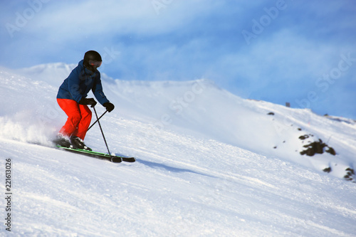 Skier riding the slope