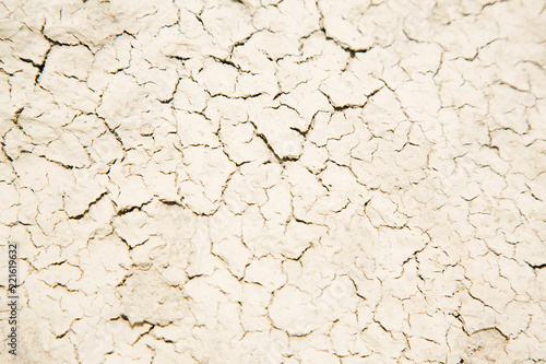 Dried rough mud, cracked surface, texture background