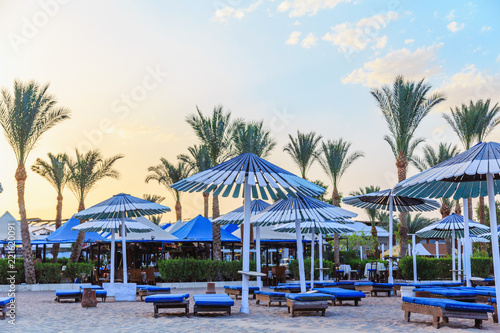 sunbeds and umbrellas on the sandy beach