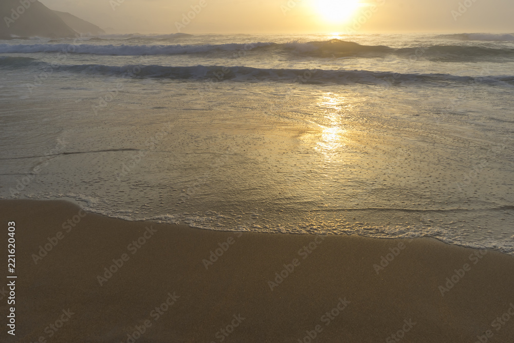 Calm, Scenic colorful sunset at the sea coast. Good for wallpaper or background image. Calm, Scenic colorful sunset at the sea coast. Good for wallpaper or background image.