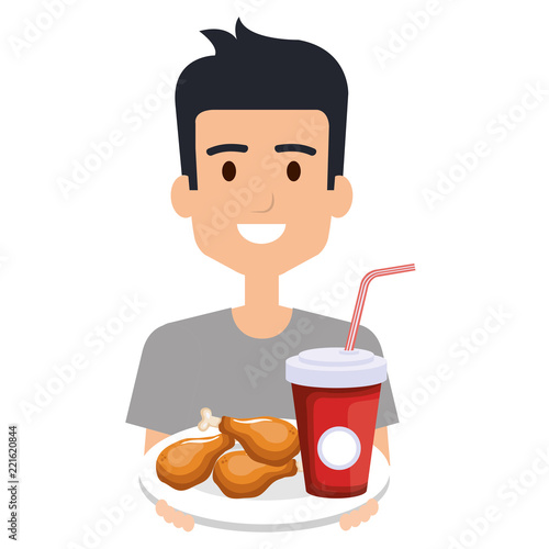 man eating chicken thighs and soda