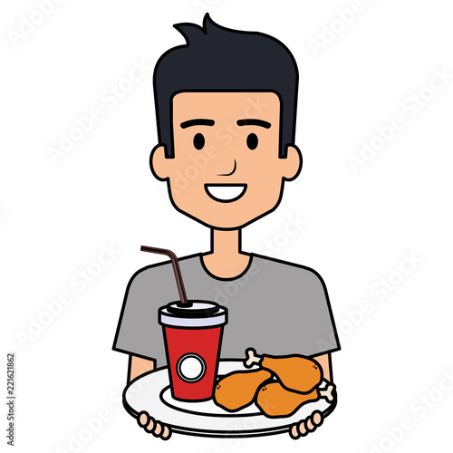 man eating chicken thighs and soda
