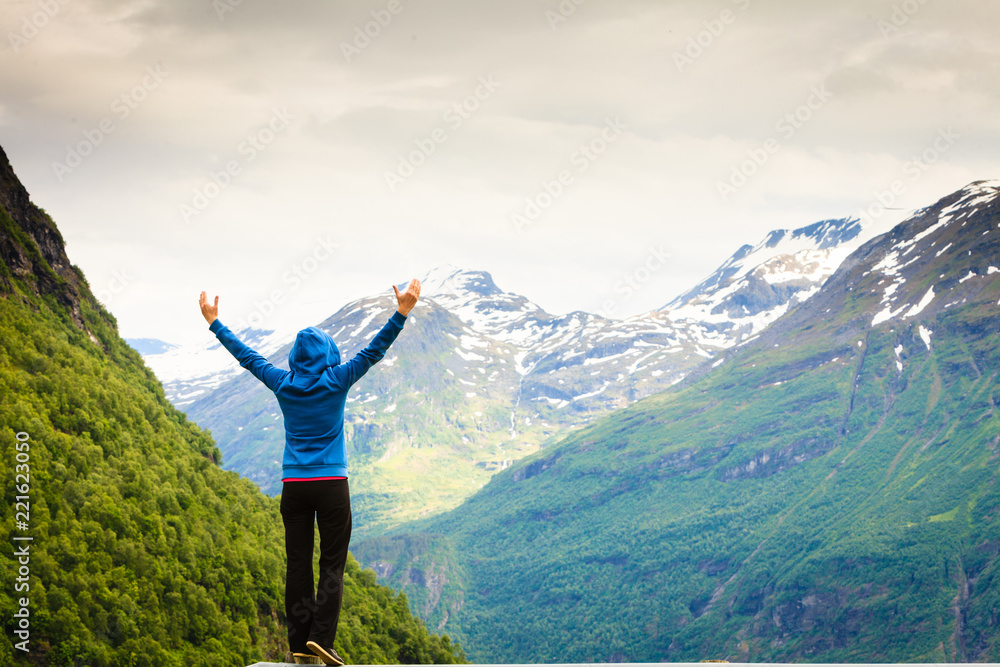 Tourist woman enjoying mountains landscape in Norway. Tourist woman enjoying mountains landscape in Norway.