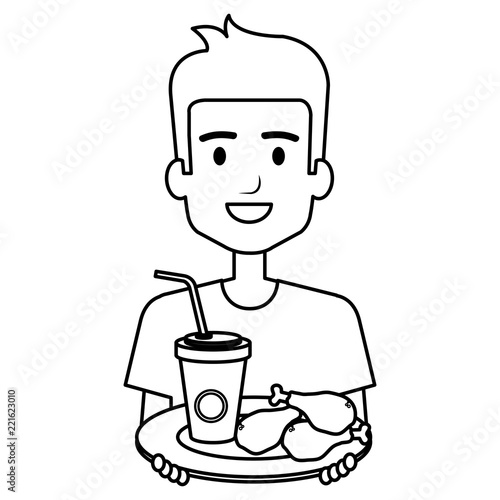 man eating chicken thighs and soda