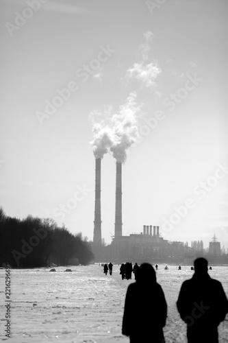 Old photo. Morning. Factory workers rushing to work