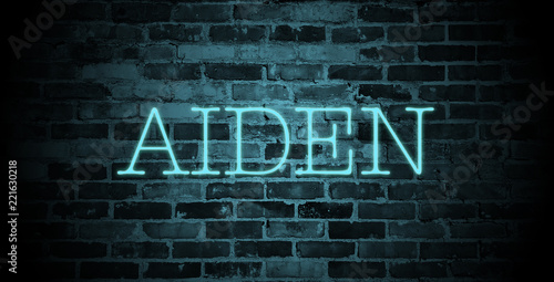 first name Aiden in blue neon on brick wall
