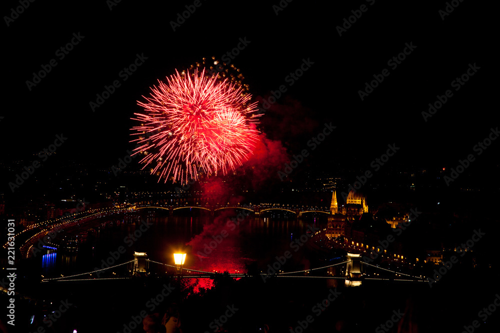 the 20th of August fireworks over Budapest Parliament, the Danube and chain bridge on St. Stephens or foundation day of Hungary the 20th of August fireworks over Budapest Parliament, the Danube and chain bridge on St. Stephens or foundation day of Hungary