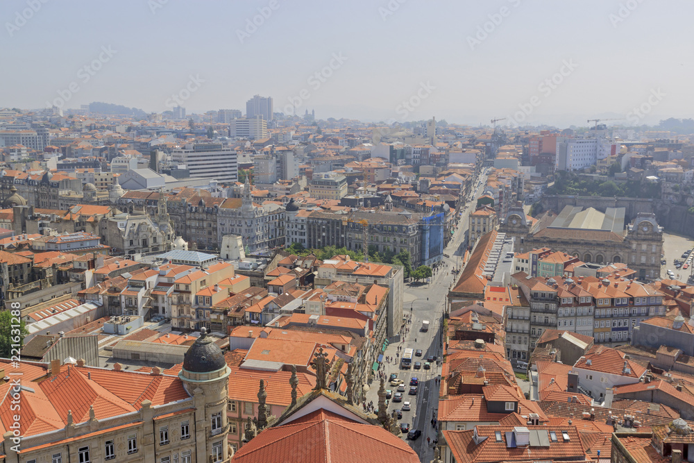 Scenic view of Porto, Portugal from the window of the tower. Orange roofs of the houses.