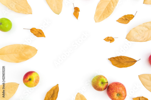 Fototapeta Naklejka Na Ścianę i Meble -  Autumn frame of fall leaves and apples on white background. Thanksgiving day. Flat lay, top view