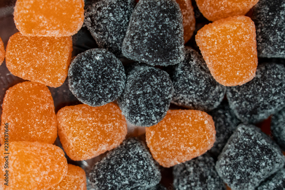 Black and Orange Halloween candy spice drops close up macro Black and Orange Halloween candy spice drops close up macro