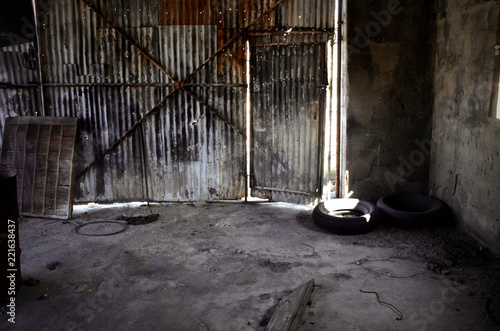 corrugated metal door and wall of old repair garage