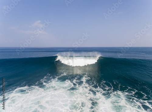 Aerial view of a Surfer on a wave in Hawaii
