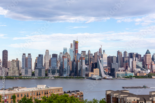New York City midtown Manhattan skyline panorama view from Boulevard East Old Glory Park over Hudson River. photo