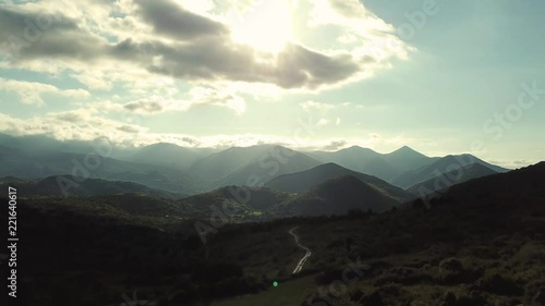Aerial view of pyrenean mountains with shining sun, Ariege in the southern of France